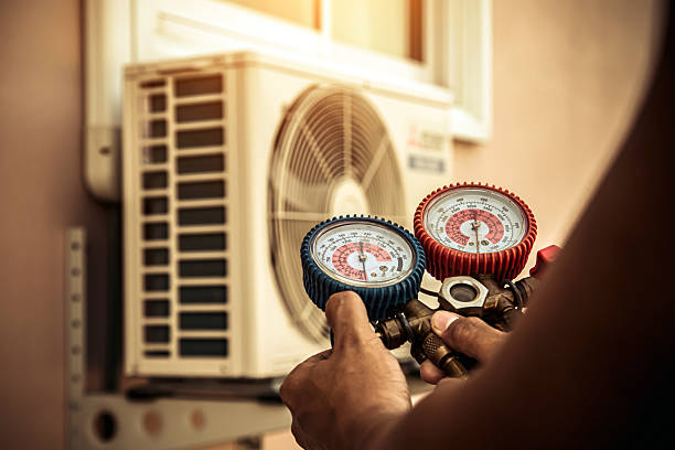 Professional Air Conditioning Service technician working in Cedar Hill, TN